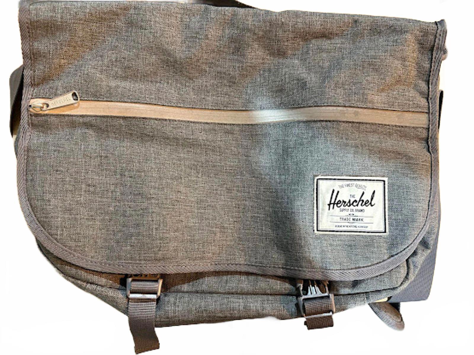 Herschel bag. 17x13x3. Red striped lining