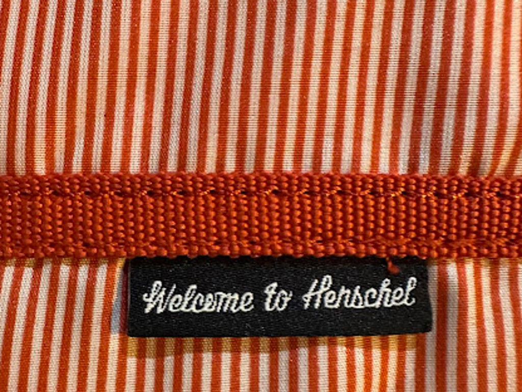 Herschel bag. 17x13x3. Red striped lining