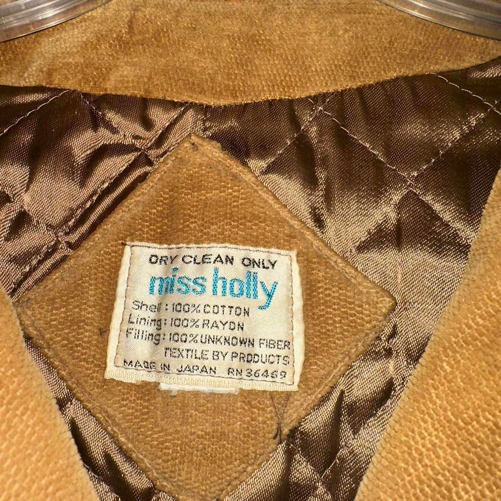 Brown corduroy pea coat with a retro vibe