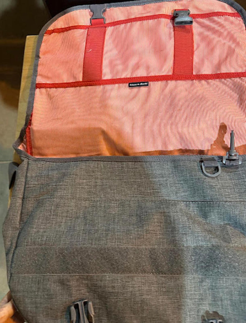 Herschel bag. 17x13x3. Red striped lining