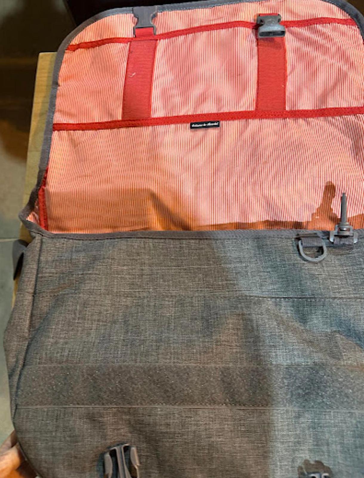 Herschel bag. 17x13x3. Red striped lining
