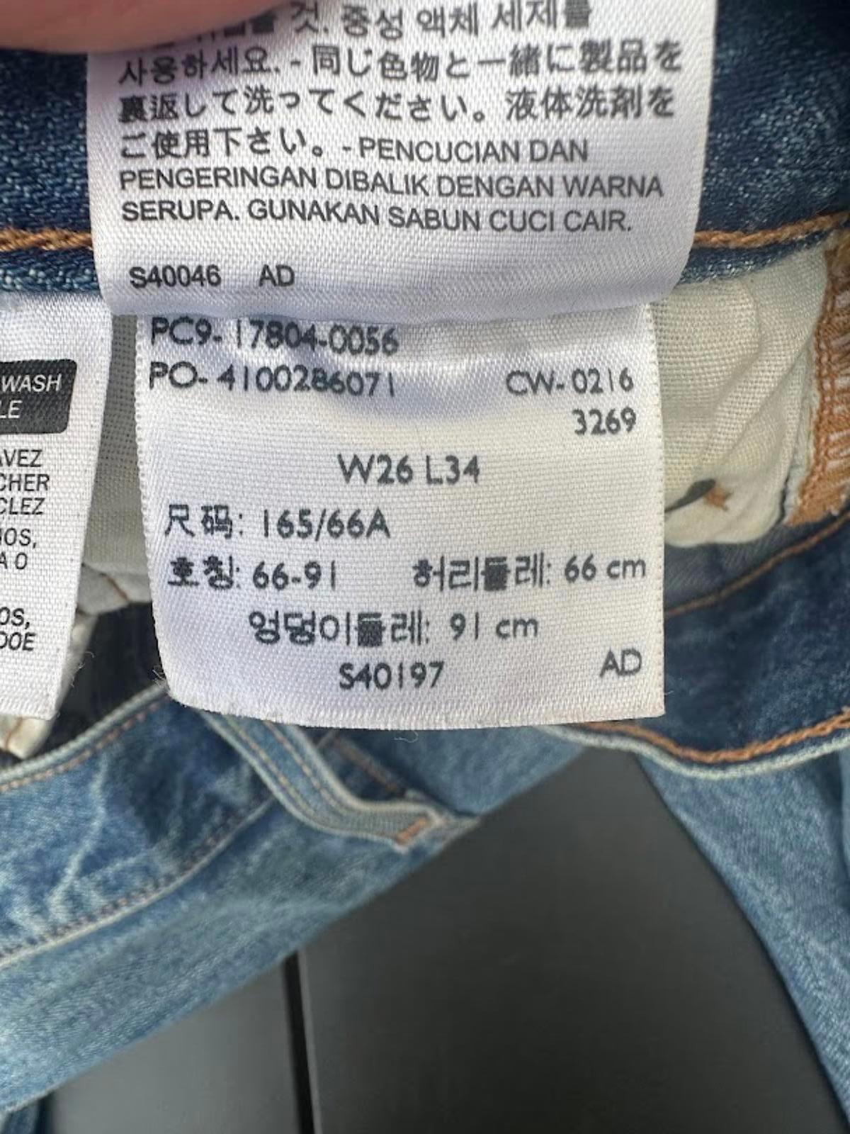 Levi’s 501 CT W26 Distressed Tapered Jeans