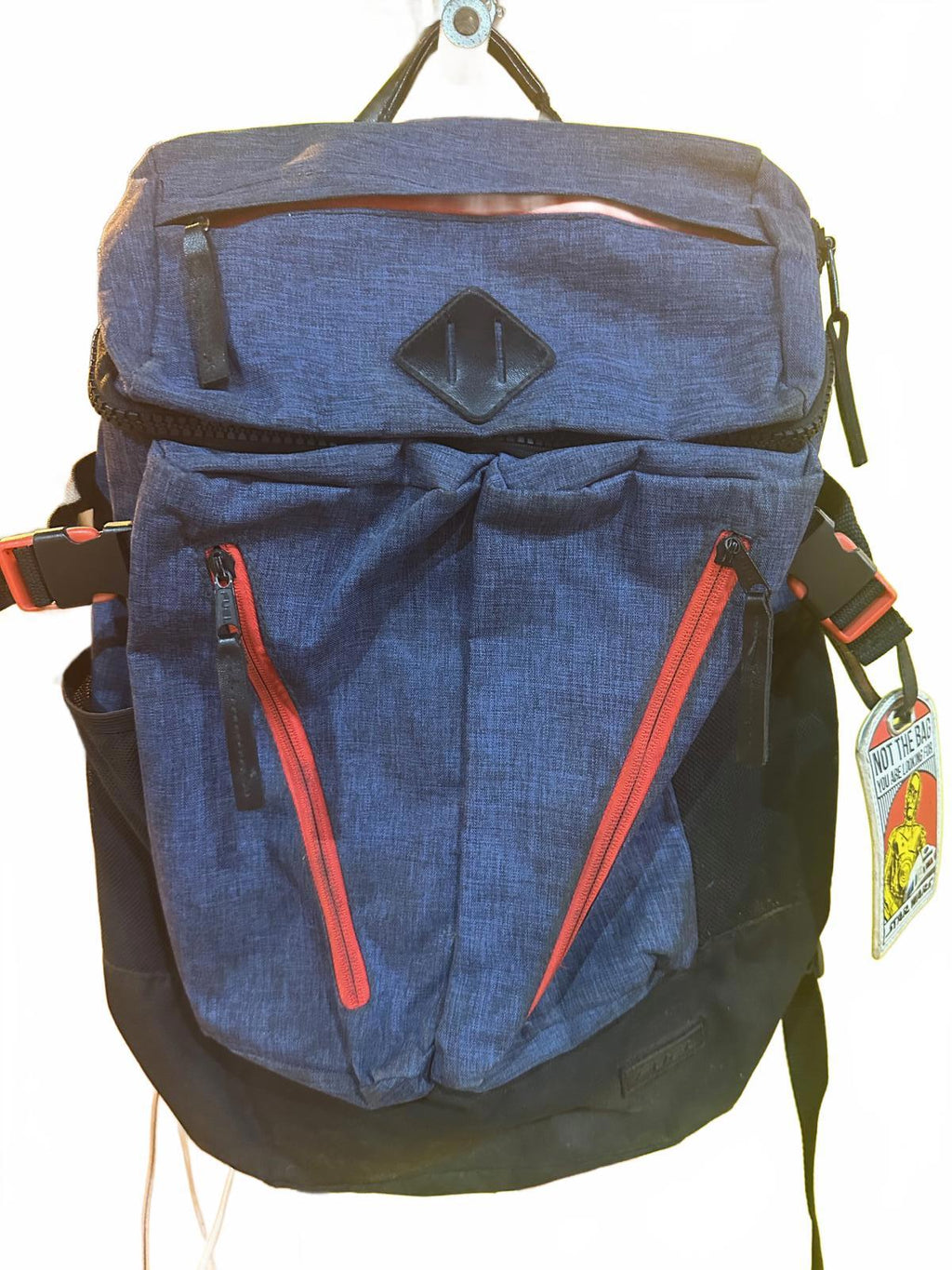 Blue and Black Multi-Pocket Urban Backpack with Red Zippers