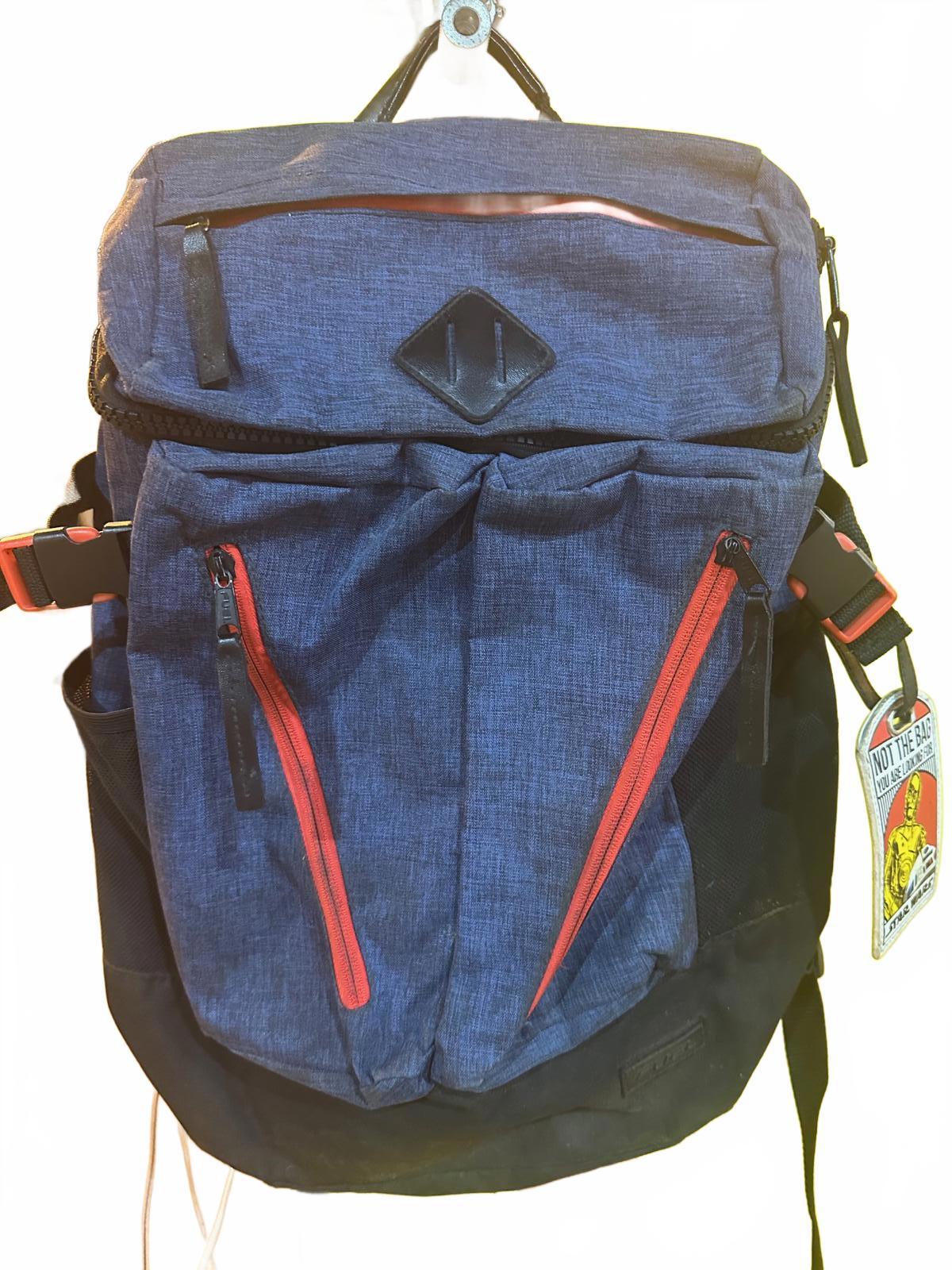 Blue and Black Multi-Pocket Urban Backpack with Red Zippers