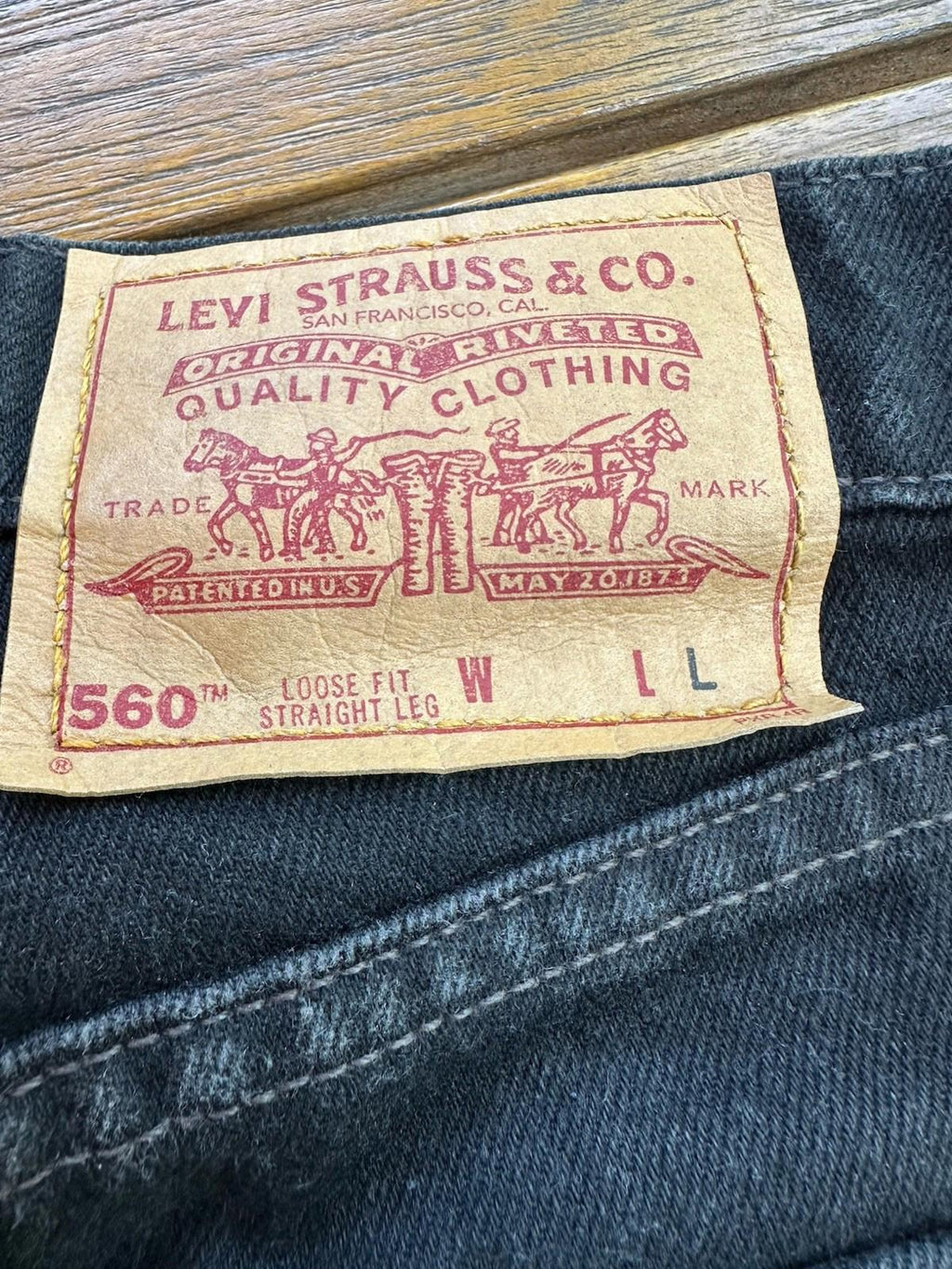 Vintage Levi’s 560 Loose Fit Straight Leg 13 Jr. Black Denim Jeans USA 90s