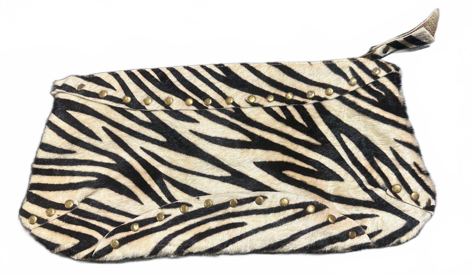 E.D.E. Zebra Print Hair-On Hide Clutch Wristlet