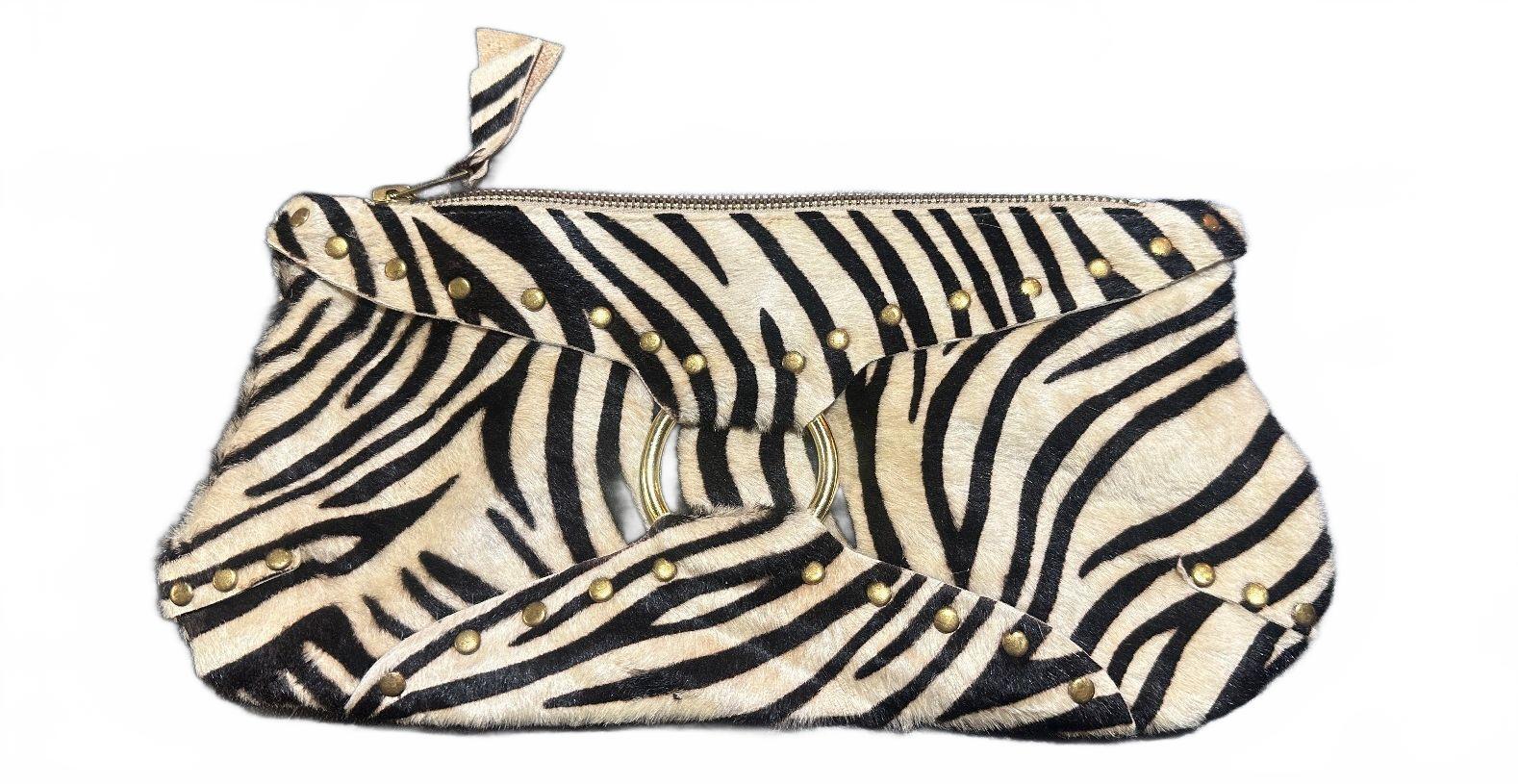 E.D.E. Zebra Print Hair-On Hide Clutch Wristlet